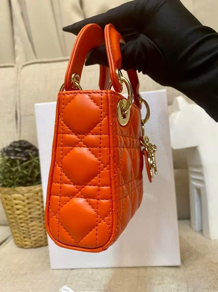 Lady Dior Micro Orange GHW 2020 Adjustable Strap (Category: Luxury Bags & Wallets) located in Manila. Submitted by bagislifeshop (Listing ID 1162121551, Image 3). Description: Our First ever Micro Lady Dior 🧡🧡🧡 Soooo Adorable 🧡🧡🧡 On Hand in PH 🇵🇭 100% Authentic Lady Dior Micro Orange GHW 2020 Adjustable Strap Condition: 9/10 Comes with Box Dustbag Entrupy Cert and Booklet.