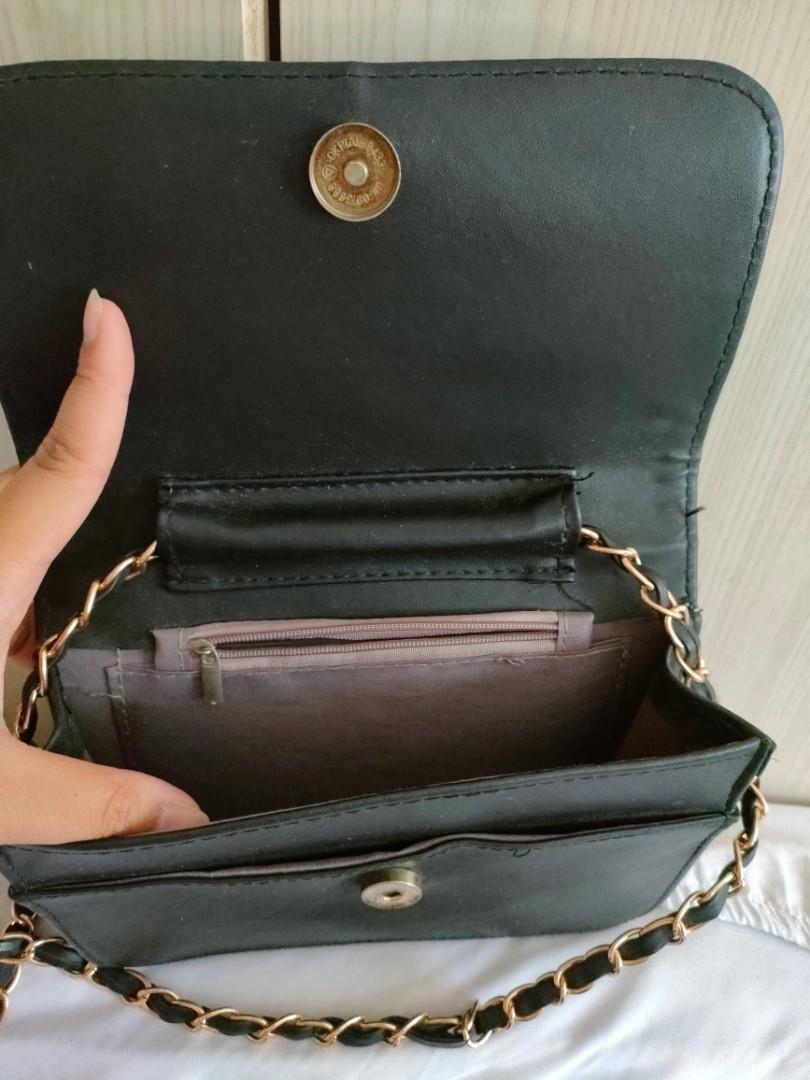 Sling bag with metal chain clearance