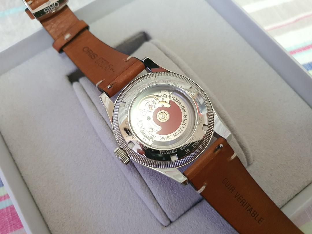 Oris Big Crown Pointer Date Automatic Watch (Category: Men's Watches) located in Singapore. Submitted by thewildfiresg (Listing ID 1162028041, Image 5). Description: Listed for sale is a pre-owned Oris Big Crown Pointer Date self-winding automatic watch. Features a 36mm stainless steel case with a bronze bezel surrounding a blue dial on a brown leather strap with a stainless steel tang buckle. Functions include hours, minutes, small seconds and d