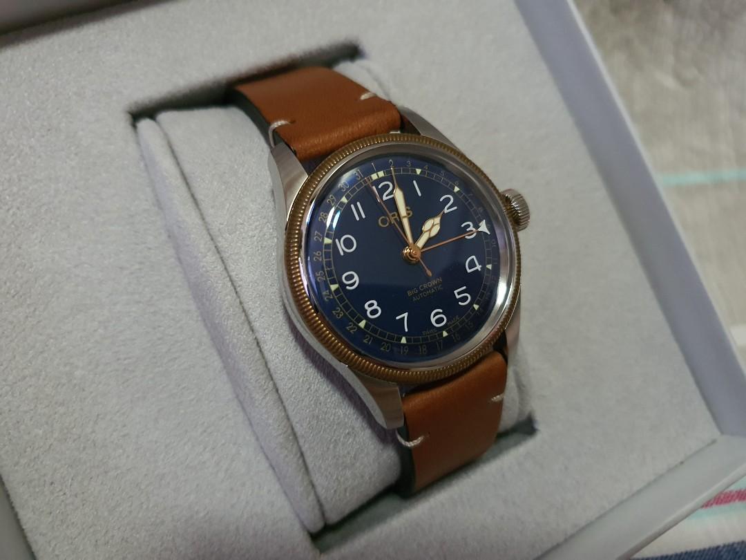 Oris Big Crown Pointer Date Automatic Watch (Category: Men's Watches) located in Singapore. Submitted by thewildfiresg (Listing ID 1162028041, Image 4). Description: Listed for sale is a pre-owned Oris Big Crown Pointer Date self-winding automatic watch. Features a 36mm stainless steel case with a bronze bezel surrounding a blue dial on a brown leather strap with a stainless steel tang buckle. Functions include hours, minutes, small seconds and d