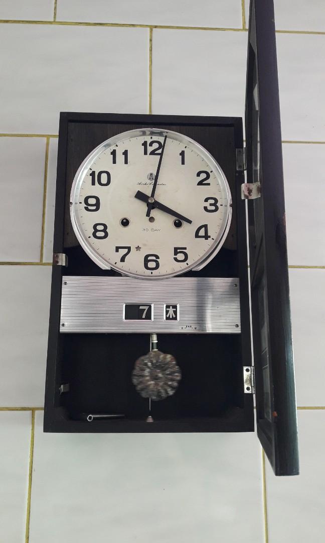 Pendulum wall clock 《 AICHI CALENDAR 》 (Category: Clocks) located in Caloocan City. Submitted by great_2003 (Listing ID 1162004891, Image 2). Description: good running condition made in japan maayos napo lahat isasabit nalang po improvised pendulum complete accessory with key as is only wysiwyg.