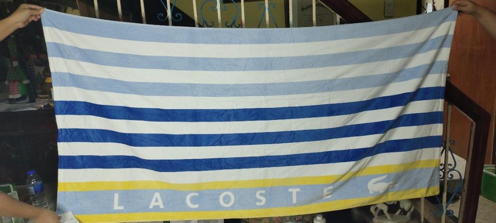 LACOSTE BOARDWALK STRIPE BEACH TOWEL (Category: Bedding & Towels) located in Malabon City. Submitted by gie_silva (Listing ID 1162195047, Image 1). Description: Stay stylish while seaside with the bold stripes and iconic crocodile logo featured on this super-soft Boardwalk cotton beach towel from Lacoste. Dimensions: 36" x 72" Soft cotton velvet on the face, absorbent terry cloth on the reverse Each towel sold individually; Includes 1 towel 390 G