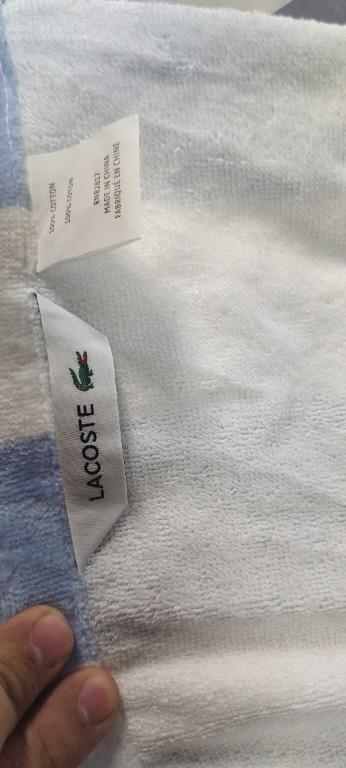 LACOSTE GRADIENT GEOMETRIC COTTON BEACH TOWEL (Category: Bedding & Towels) located in Caloocan City. Submitted by hmsilvaprinting-91045 (Listing ID 1162194551, Image 2). Description: BRAND NEW ON HAND ITEM SAME DAY DELIVERY Stay comfortable and stylish while you soak up some sun with the help of this super-soft cotton beach towel from Lacoste, featuring a gradient geometric pattern with croc logo accents and an absorbent terry cloth reverse. Dime
