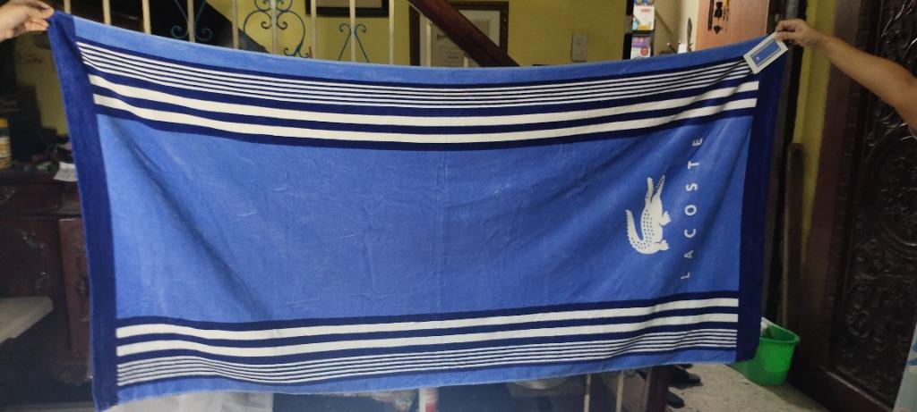 LACOSTE OKI COTTON STRIPE BEACH TOWEL (Category: Bedding & Towels) located in Valenzuela. Submitted by 11francispaulo (Listing ID 1162193719, Image 3). Description: BRAND NEW ITEM ON HAND SAME DAY DELIVERY Super-soft cotton and stylish stripes make this Oki towel from Lacoste the perfect choice for the beach and beyond. Dimensions: 36" x 72" Soft cotton velvet on the face, absorbent terry cloth on the reverse Each towel sold individually; Include