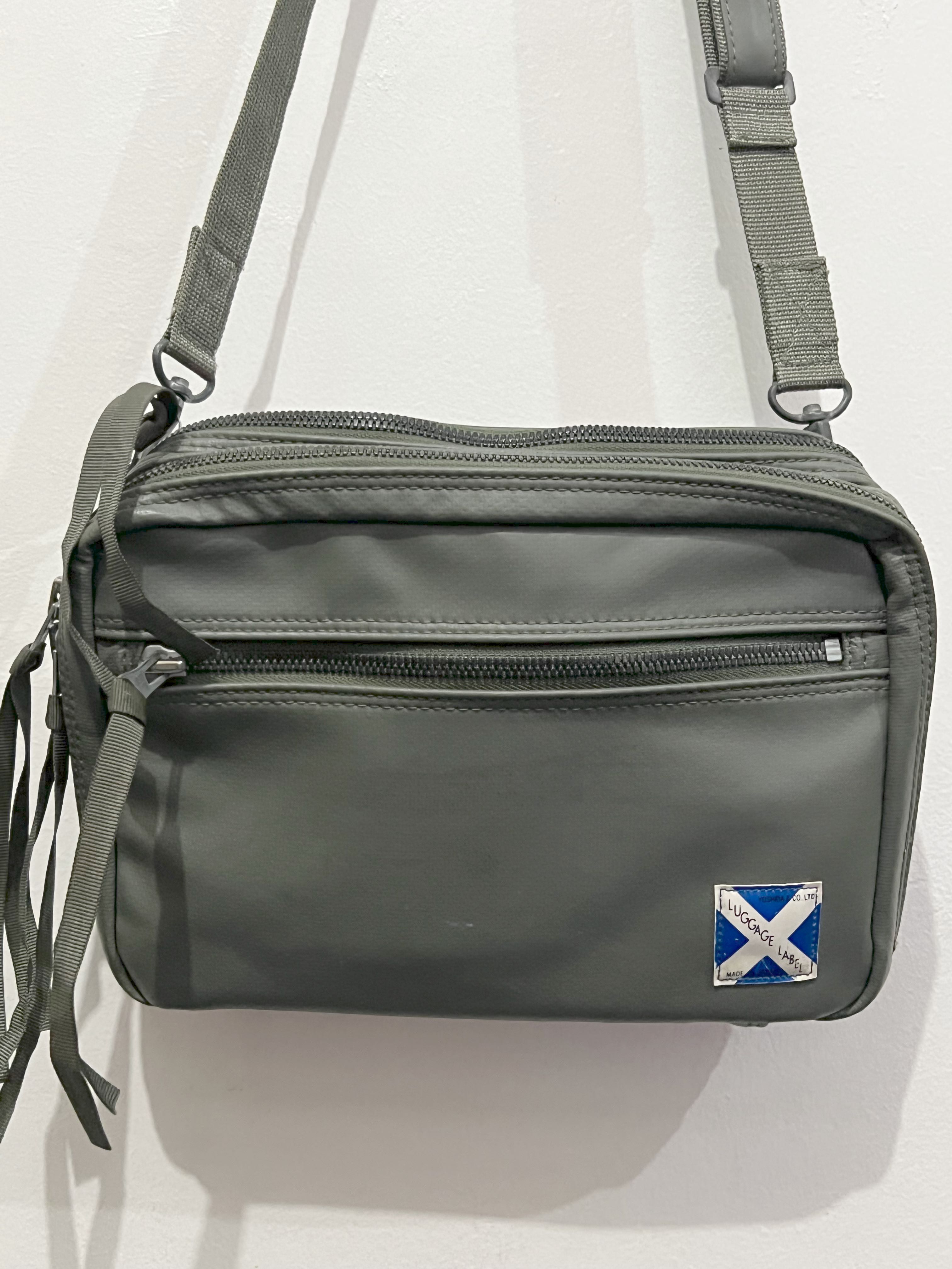 Luggage label sling bag deals