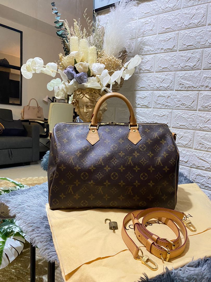 Authentic Louis Vuitton Speedy 40 Bandouliere, Luxury, Bags & Wallets on  Carousell