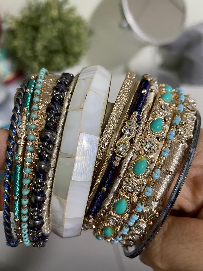 Bangles (Category: Bracelets) located in Singapore. Submitted by nezhh (Listing ID 1162534043, Image 4). Description: $8 for 15 bangles!! Never use before but didn’t keep the tag. Item still shiny and in very good condition. Decided to let it go because need to move house and I won’t wear it anymore..