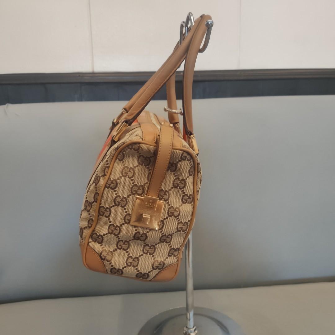 📌Guarantee Authentic 💯 💯💯 GUCCI📌 (Category: Luxury Bags & Wallets) located in Manila. Submitted by outerwearsmanila (Listing ID 1162512978, Image 2). Description: PRELOVED 💯❤️✅ GUARANTEE AUTHENTIC 💯✅❤️ The overall condtion of the bag is excellent vintage condition. The bag has been well kept and gently used. The leather trim remains in fantastic condition even there are some minor signs of use usage in the picture. The canvas and the web a