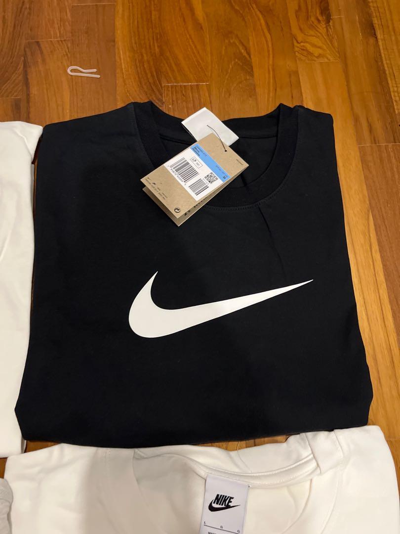 Nike t shirt top tick in middle