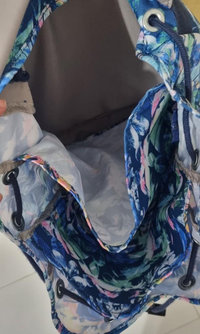 Kipling backpack (Category: Backpacks) located in Singapore. Submitted by hyc1988 (Listing ID 1162670714, Image 4). Description: excellent condition kipling backpack. drawstring with buckle flap and front zip compartment. main compartment has two large dividers and side zip for easy access..