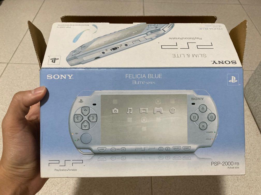 Sony PSP Slim & Lite Handheld Game Console - Ice Silver