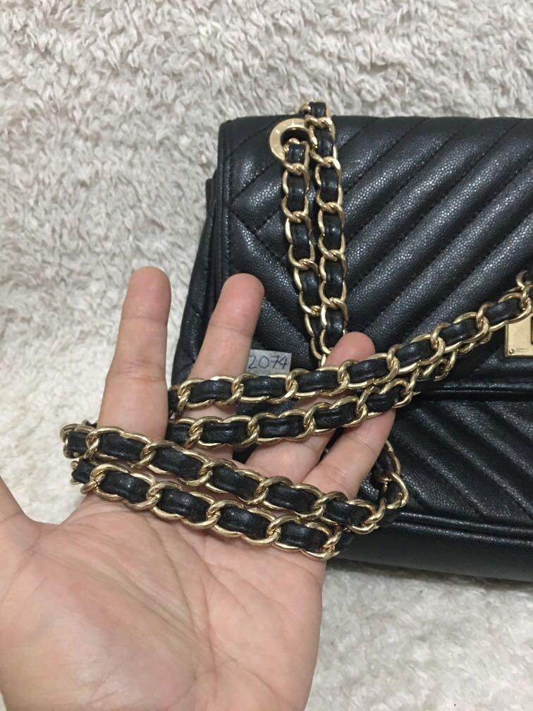 Sisley quilted chain sling, Luxury, Bags & Wallets on Carousell
