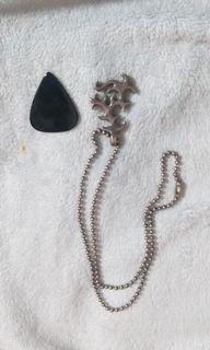 Sterling silver necklace with guitar pick pendant