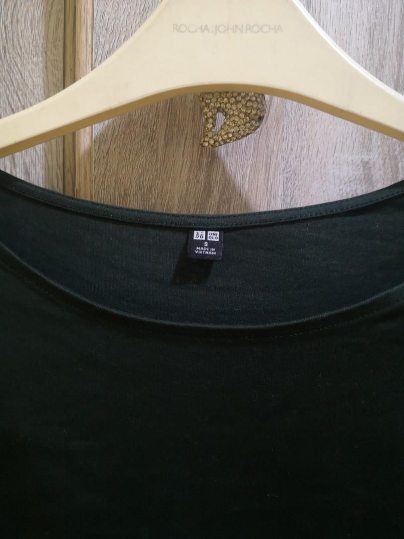 Uniqlo puff sleeve blouse (Category: Blouses) located in Quezon City. Submitted by hellobuyeverything (Listing ID 1162668026, Image 2). Description: good as new, fits small to semi medium size. color: Army green.