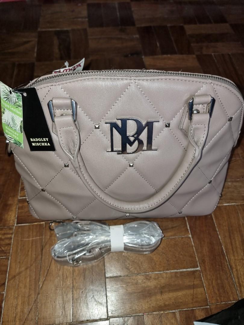 Badgley Mischka alma bag (Category: Cross-body Bags) located in Tuguegarao City. Submitted by anapaulozoe (Listing ID 1162814234, Image 1). Description: Badgley Mischka bnwt vegan leather taupe color, hand and sling, alma type measures 14x9x5.5 inches from the US, maganda panregalo need funds.