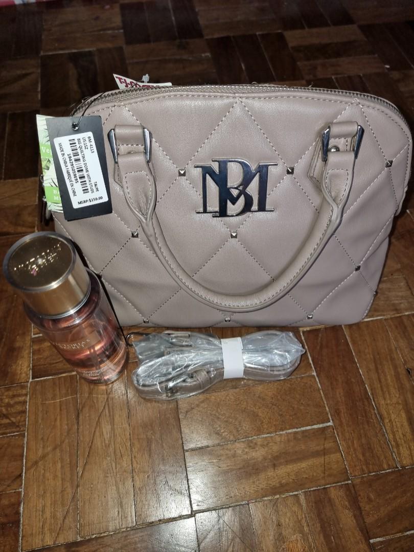 Badgley Mischka alma bag (Category: Cross-body Bags) located in Tuguegarao City. Submitted by anapaulozoe (Listing ID 1162814234, Image 2). Description: Badgley Mischka bnwt vegan leather taupe color, hand and sling, alma type measures 14x9x5.5 inches from the US, maganda panregalo need funds.