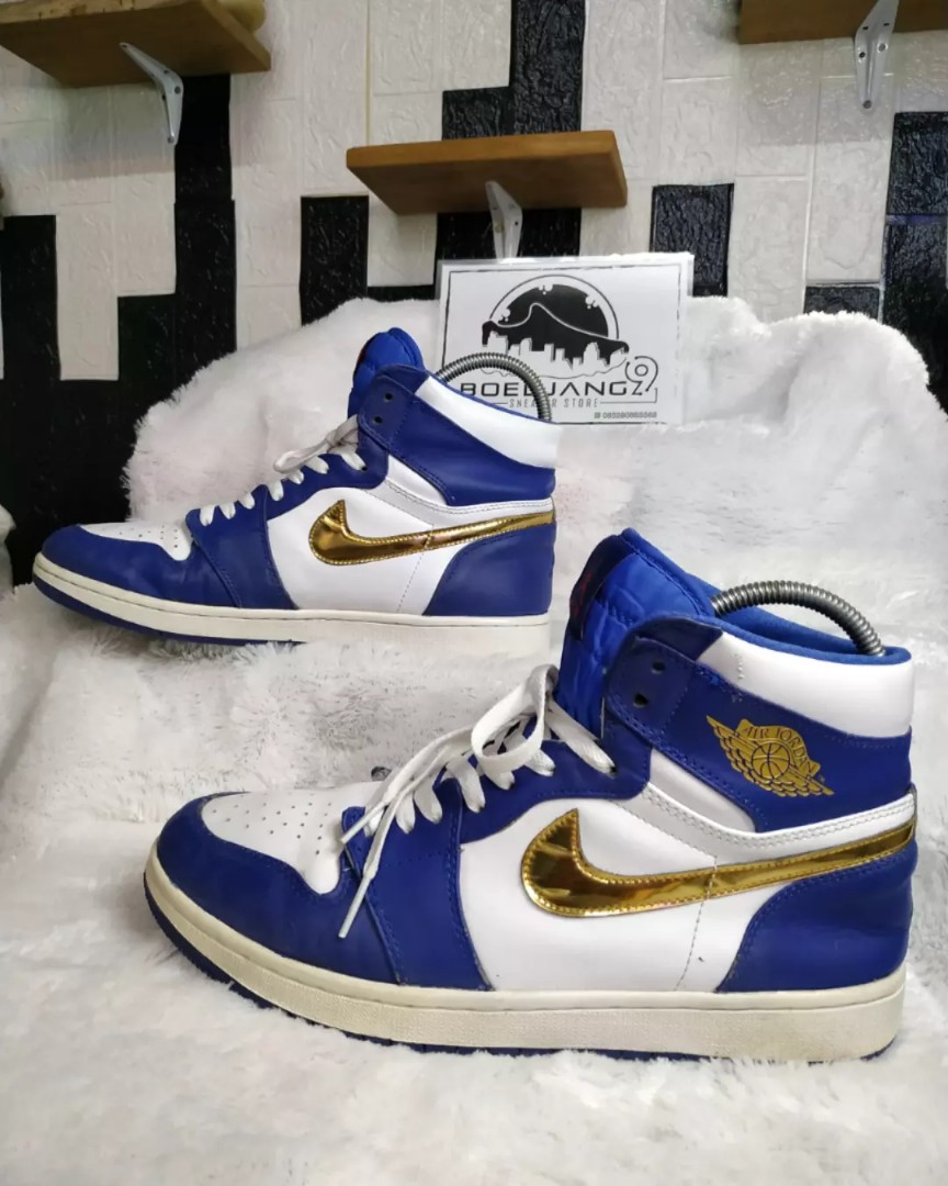 blue and gold jordan 4