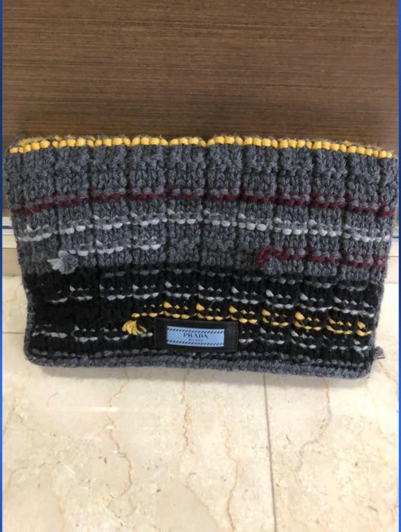 Prada Knit Sweater Etiquette Chain Shoulder Bag Clutch Gucci LV (Category: Bags & Wallets) located in Singapore. Submitted by funedu (Listing ID 1163261725, Image 2). Description: In superb condition! Authentic, very rare design! Can fit A4 size Comes with gold chain for shoulder bag Great casual, boho vibe. It can match most outfit due to its neutral multi colour! RTP $2000+.