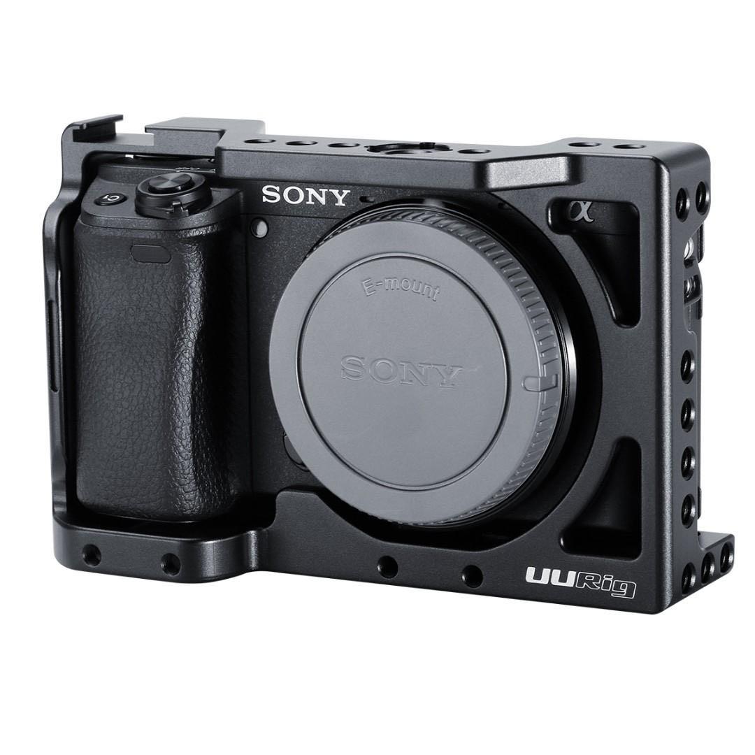 Sony a6400 with camera cage and extra batteries and battery charger
