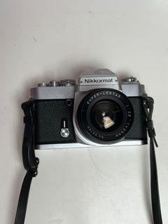 35mm Manual SLR Film Camera: Nikkormat EL with free 28mm lens and strap