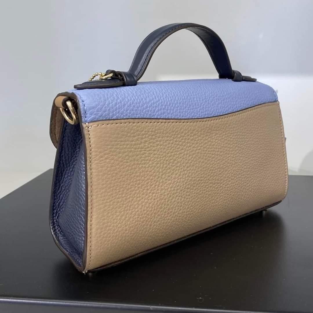 Coach Kleo Top Handle in Colorblock (Category: Luxury Bags & Wallets) located in Quezon City. Submitted by bagsboutiqueph (Listing ID 1163420630, Image 2). Description: LAST PRICE POSTED. LIMITED STOCKS ONLY. NEW ARRIVAL BRANDNEW WITH INCLUSIONS. ACTUAL AND DETAILED PHOTOS POSTED. OTHER PHOTOS WILL BE SEND DURING PURCHASE AND FOR SURE BUYERS ONLY. WHEN IN DOUBT, DO NOT ORDER. THANK YOU..