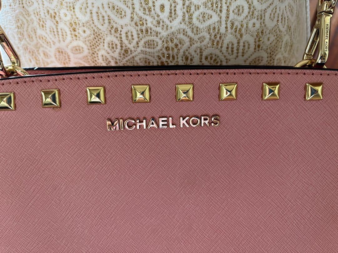 Michael Kors Selma Bag Dusty Pink (Category: Luxury Bags & Wallets) located in Davao. Submitted by madamewoo (Listing ID 1163353971, Image 3). Description: Must have a shopee account to purcahse this item! Like New MK Selma Bag In Dusty Pink Saffiano leather with studs.