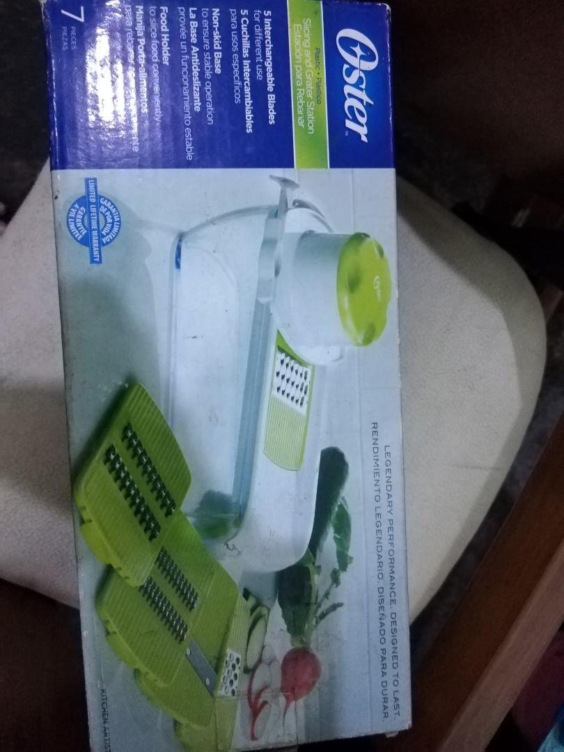 Oster slicer grater (Category: Other Kitchenware & Tableware) located in Las Pinas. Submitted by mommys_koleksyon011 (Listing ID 1163475643, Image 1). Description: Nakatagong gamit not sure kung nagamit na pero ung ibang slicer is bnew pa....