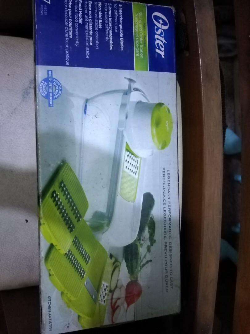 Oster slicer grater (Category: Other Kitchenware & Tableware) located in Las Pinas. Submitted by mommys_koleksyon011 (Listing ID 1163475643, Image 2). Description: Nakatagong gamit not sure kung nagamit na pero ung ibang slicer is bnew pa....