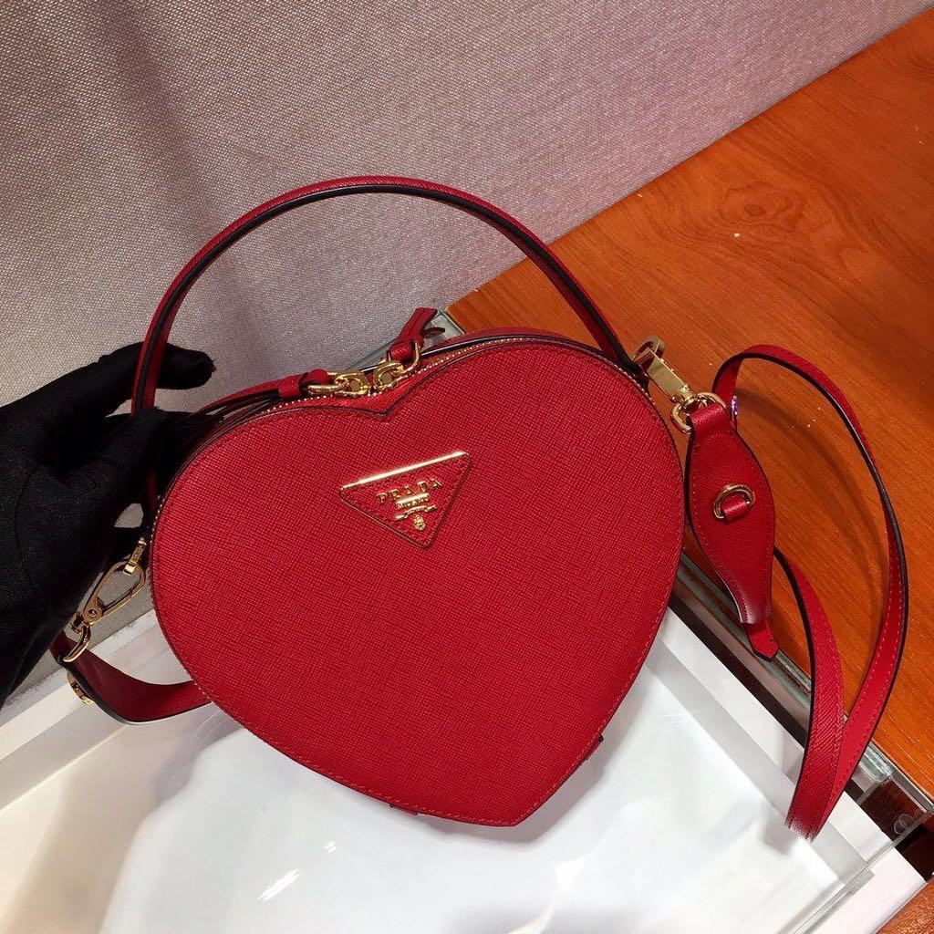 Prada odette heart bag red preorder, Luxury, Bags & Wallets on
