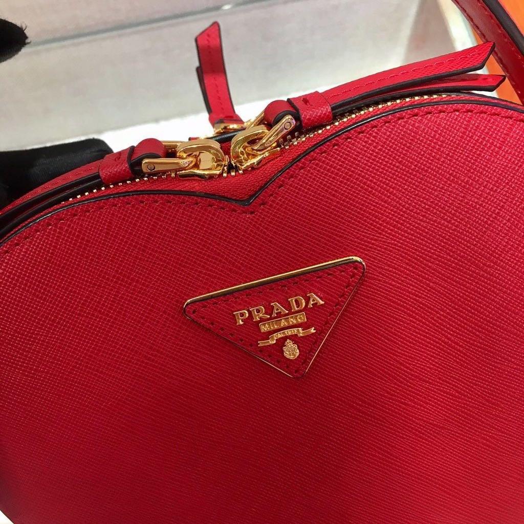 Prada odette heart, Luxury, Bags & Wallets on Carousell