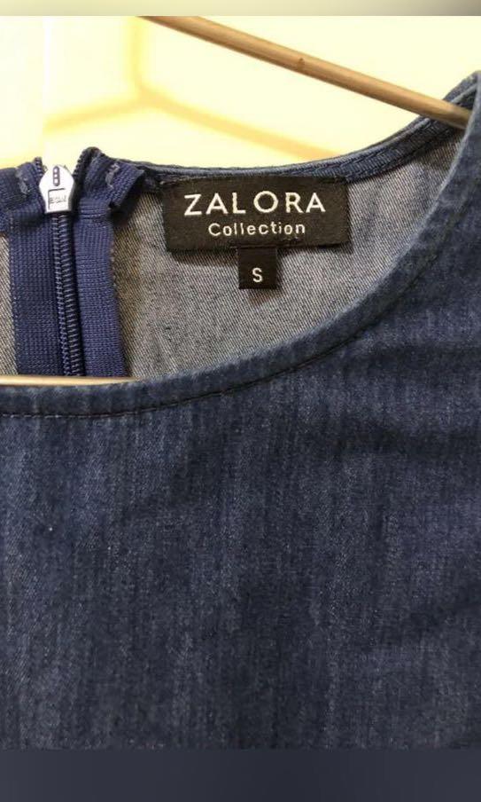 ZALORA Darm denim dress (Category: Dresses) located in Manila. Submitted by dencarmd (Listing ID 1085479286, Image 2). Description: Zalora dark denim dress with front pocket and slit, gartered waist, back zipper. Used only a few times and in very good used condition..