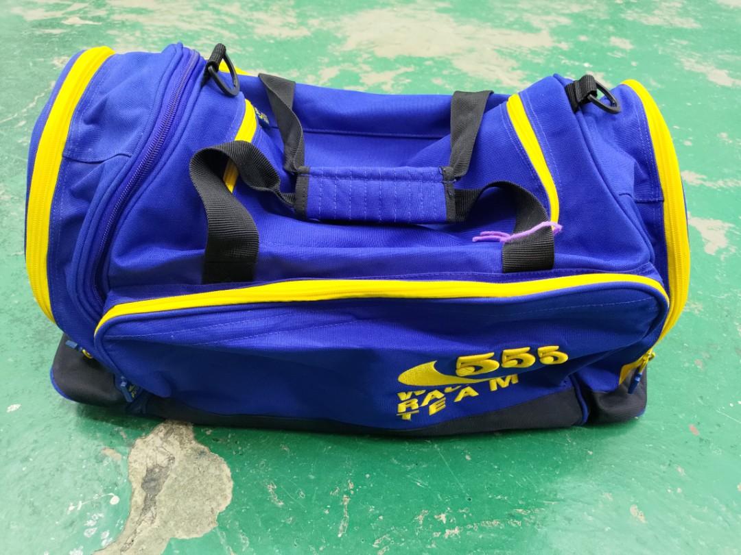555 world racing duffle bag, Luxury, Bags & Wallets on Carousell