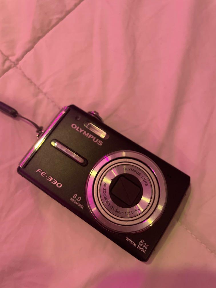 Olympus digital camera (Category: Cameras) located in Quezon City. Submitted by digicamsz (Listing ID 1158631386, Image 1). Description: OLYMPUS FE-330 8 MEGAPIXEL 5X Optical Zoom includes: battery charger original strap xd card 2GB .