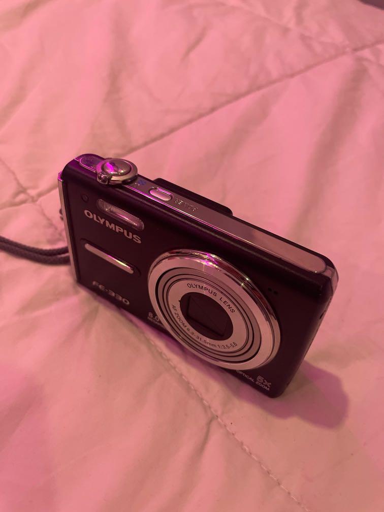 Olympus digital camera (Category: Cameras) located in Quezon City. Submitted by digicamsz (Listing ID 1158631386, Image 2). Description: OLYMPUS FE-330 8 MEGAPIXEL 5X Optical Zoom includes: battery charger original strap xd card 2GB .