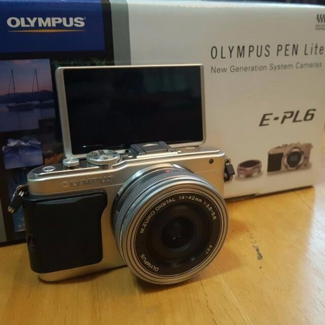 Appareil Photo Olympus PEN E-PL6 16 MP – Objectif Argent – Occasion Avec Dommages Esthétiques