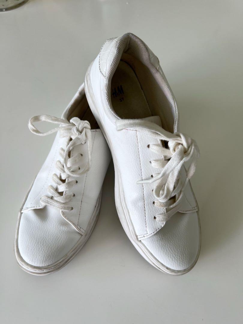 White sleek classy sneakers Women s Fashion Footwear Sneakers