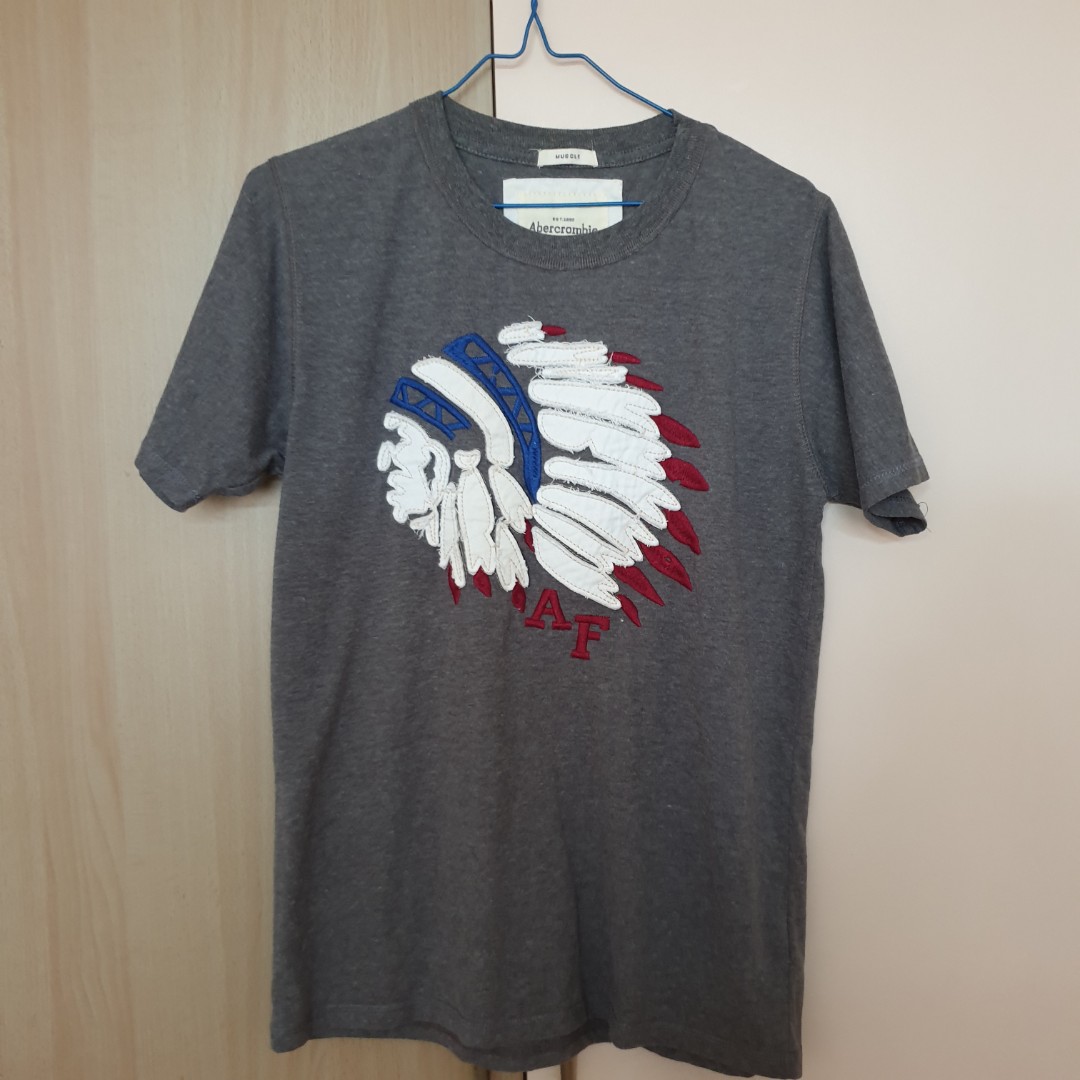Abercrombie and muscle t-shirt (grey, embroidered red chief design), Men's Fashion, Tops Sets, & Polo Shirts on Carousell