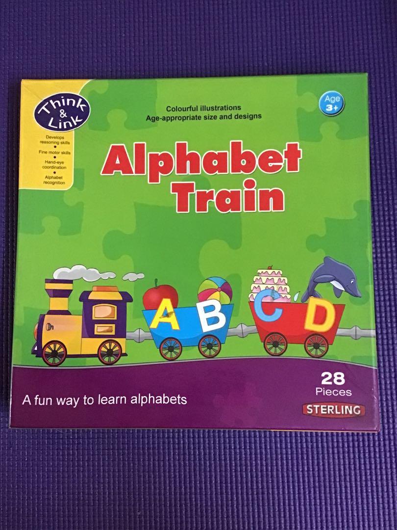 Alphabet Train Puzzle (Category: Board Games & Puzzles) located in Rizal. Submitted by bolyloli_tales.treasures (Listing ID 1163603024, Image 1). Description: Stains on cover Complete pieces and in good condition Not folded or broken .