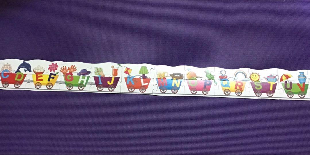 Alphabet Train Puzzle (Category: Board Games & Puzzles) located in Rizal. Submitted by bolyloli_tales.treasures (Listing ID 1163603024, Image 3). Description: Stains on cover Complete pieces and in good condition Not folded or broken .