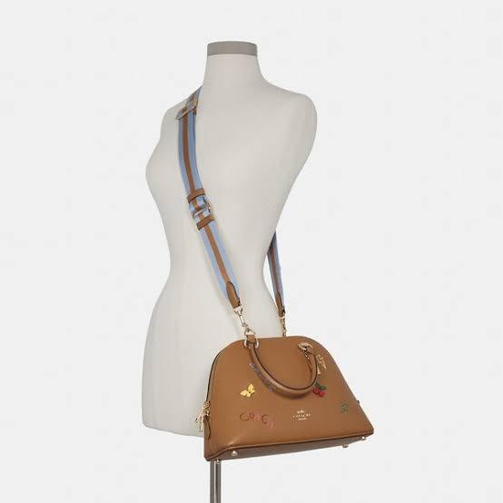 Coach Katy Satchel with Diary Embroidery (Category: Luxury Bags & Wallets) located in Mandaluyong City. Submitted by shop_0n_the_spot (Listing ID 1163682995, Image 3). Description: Coach Katy Satchel with Diary Embroidery Product Details • Refined pebble leather and smooth leather • Inside zip pocket • Zip closure, fabric lining • Handles with 3 3/4" drop • Outside zip pocket • Detachable strap with 22" drop for shoulder or crossbody wear • Four 