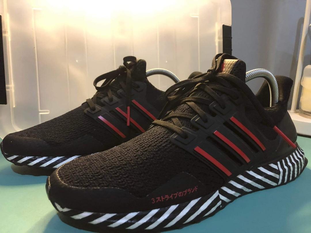 ultra boost black with red stripes