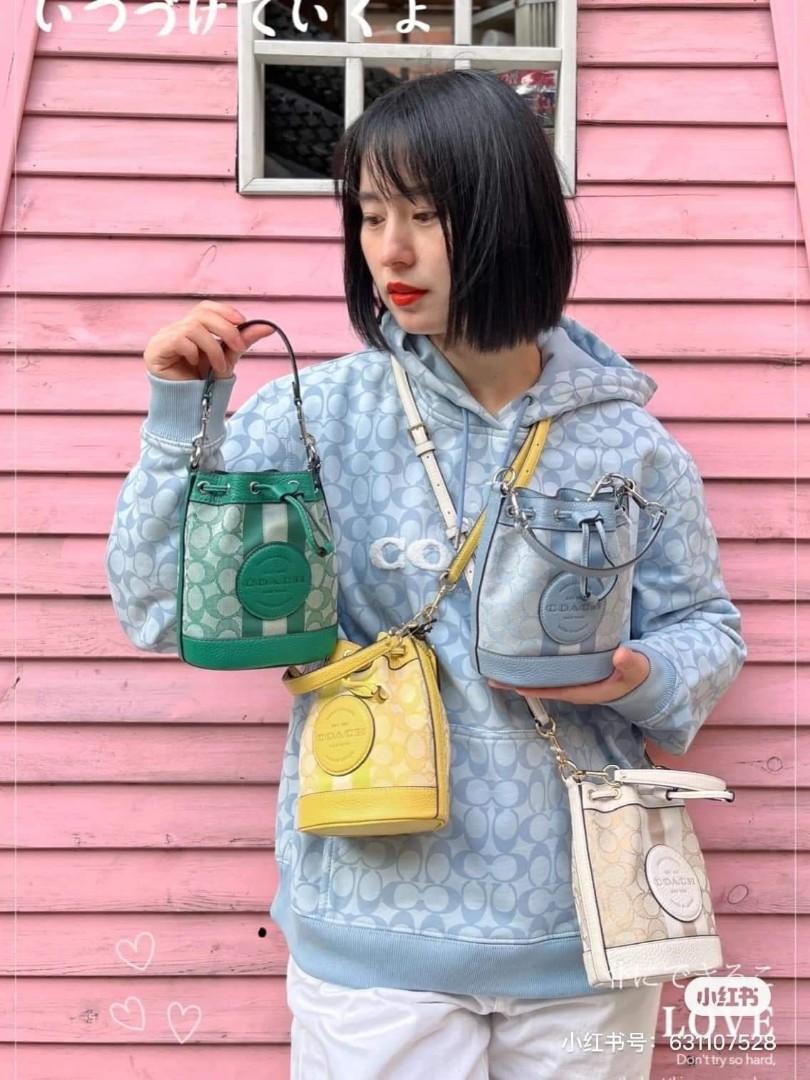 COACH MINI DEMPSEY BUCKET BAG IN SIGNATURE JACQUARD WITH STRIPE AND COACH  PATCH, Women's Fashion, Bags & Wallets, Cross-body Bags on Carousell