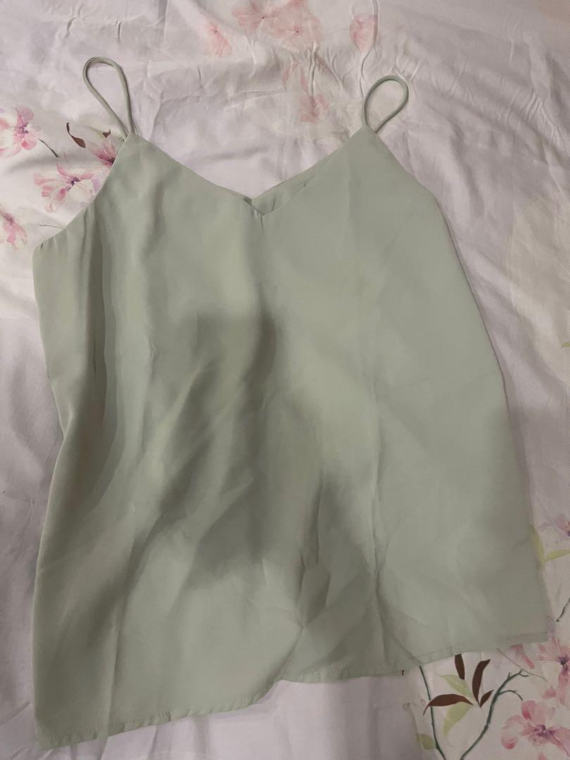 Pale green basic cami (Category: Sleeveless) located in Singapore. Submitted by hoardertendencies (Listing ID 1163812745, Image 1). Description: .