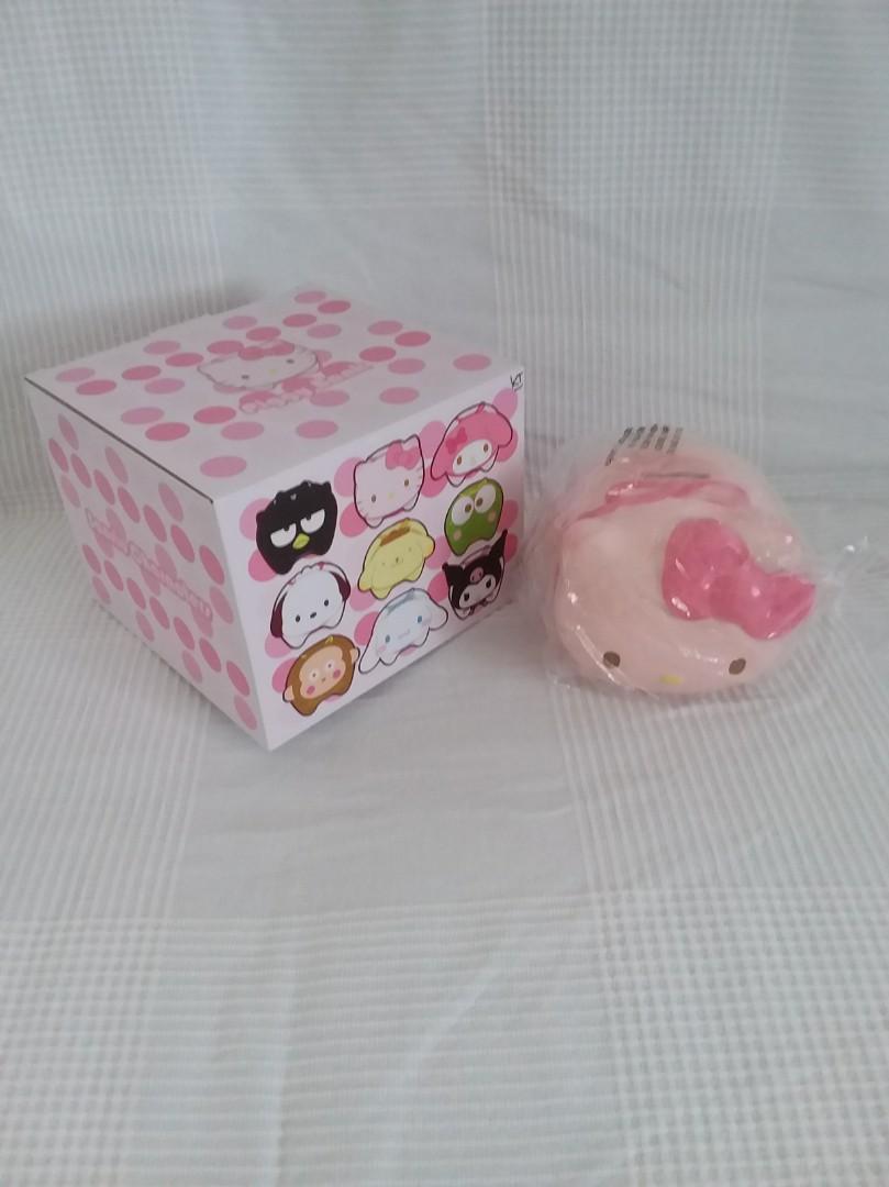 Bnib RARE hello kitty squishy cupcake dispenser/piggy bank, Hobbies