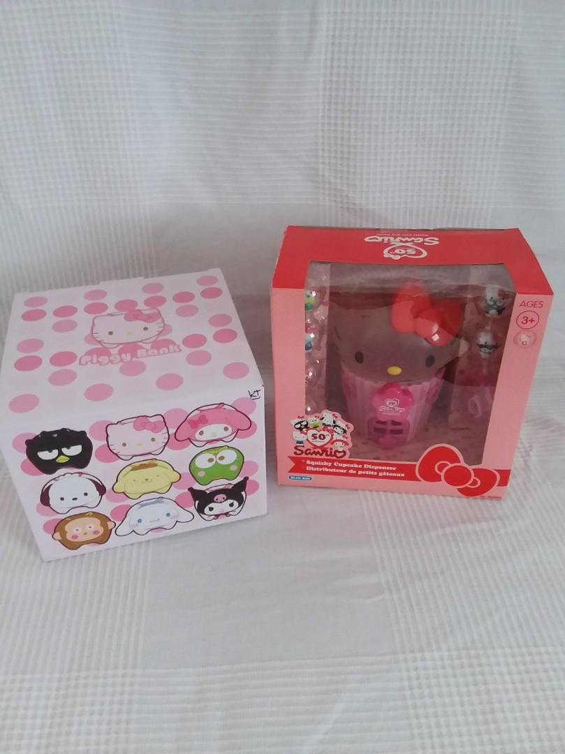 Bnib RARE hello kitty squishy cupcake dispenser/piggy bank, Hobbies