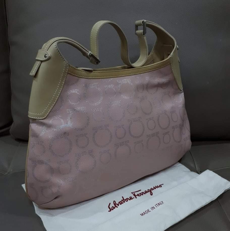 Ferragamo Pink Hobo (Category: Luxury Bags & Wallets) located in Taguig. Submitted by esa.agustin (Listing ID 1158808199, Image 1). Description: Original Ferragamo pink canvas hobo bag. With dust bag. Made in Italy..