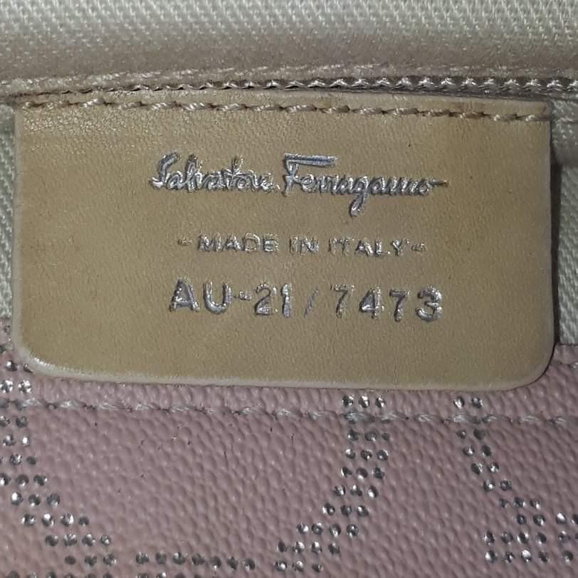 Ferragamo Pink Hobo (Category: Luxury Bags & Wallets) located in Taguig. Submitted by esa.agustin (Listing ID 1158808199, Image 2). Description: Original Ferragamo pink canvas hobo bag. With dust bag. Made in Italy..