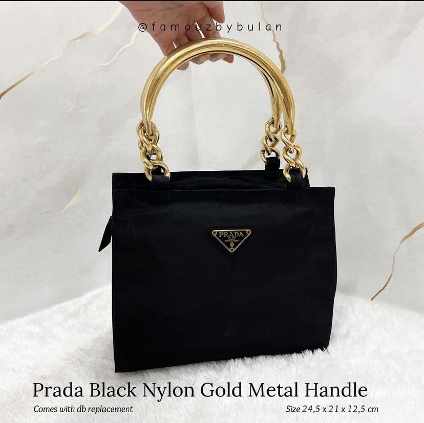 gold prada clutch