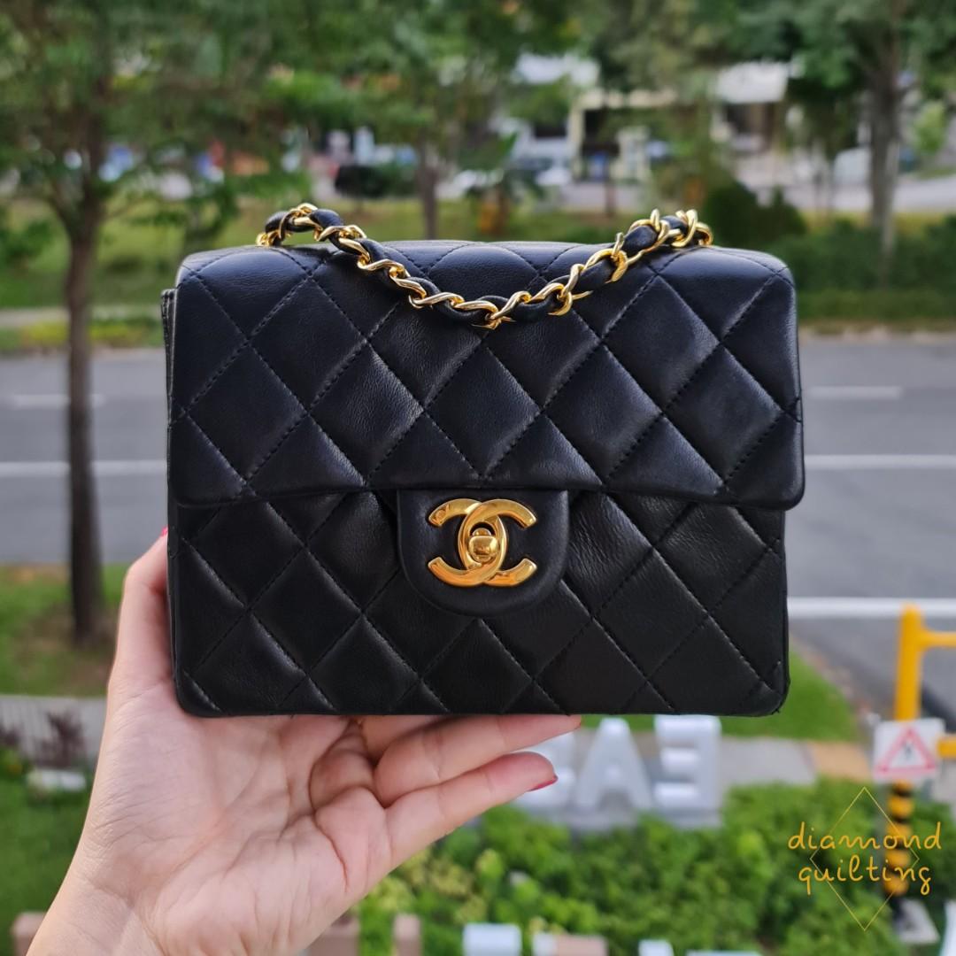 white and silver chanel bag black