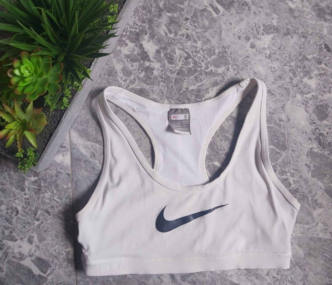 cream and black nike